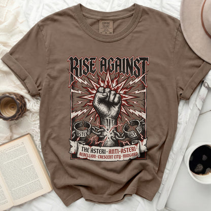 Brown t-shirt with a Rise Against fist graphic and band text.