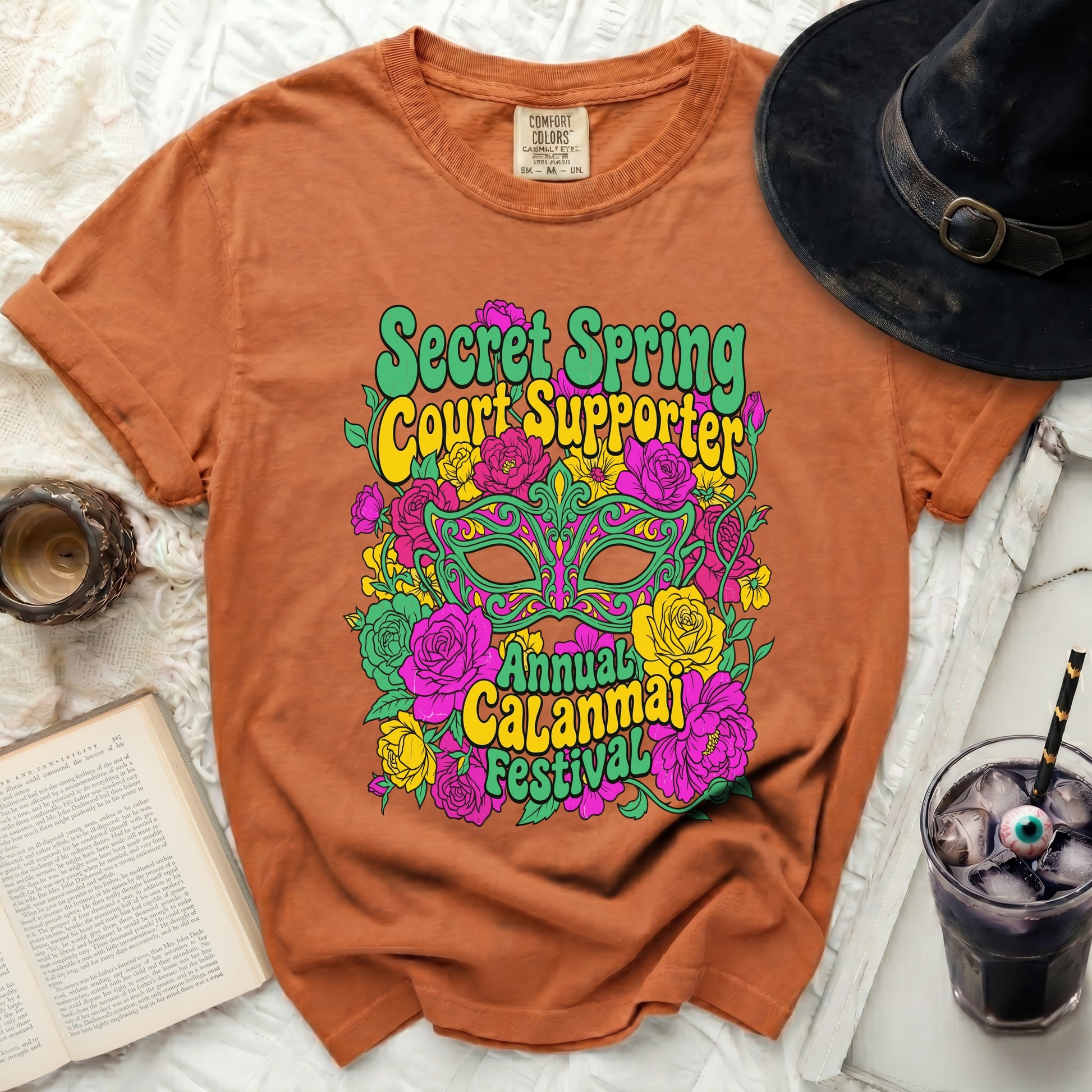 Orange t-shirt with "Secret Spring Court Supporter" and "Annual Calanmai Festival" graphics.