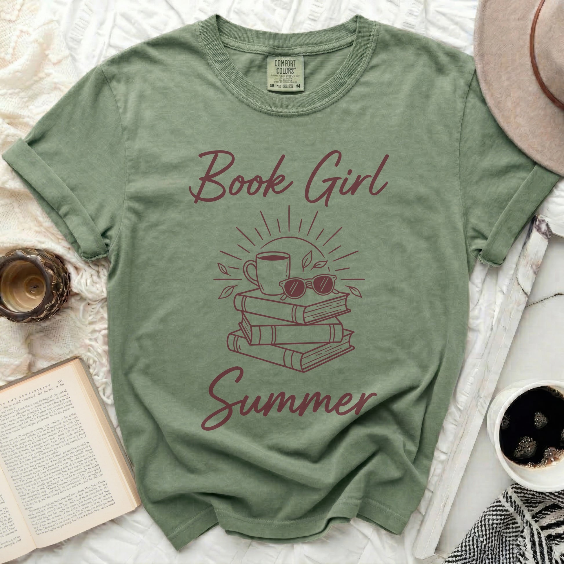 Green t-shirt with "Book Girl Summer" text and stacked books graphic.