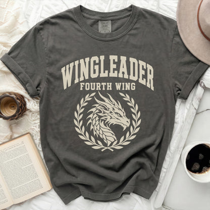 Charcoal gray t-shirt with cream text "WINGLEADER FOURTH WING" and dragon crest.
