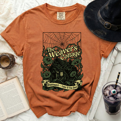 Orange t-shirt with "The Weaver's Cottage" and "Middengard - Enter If You Dare" text.