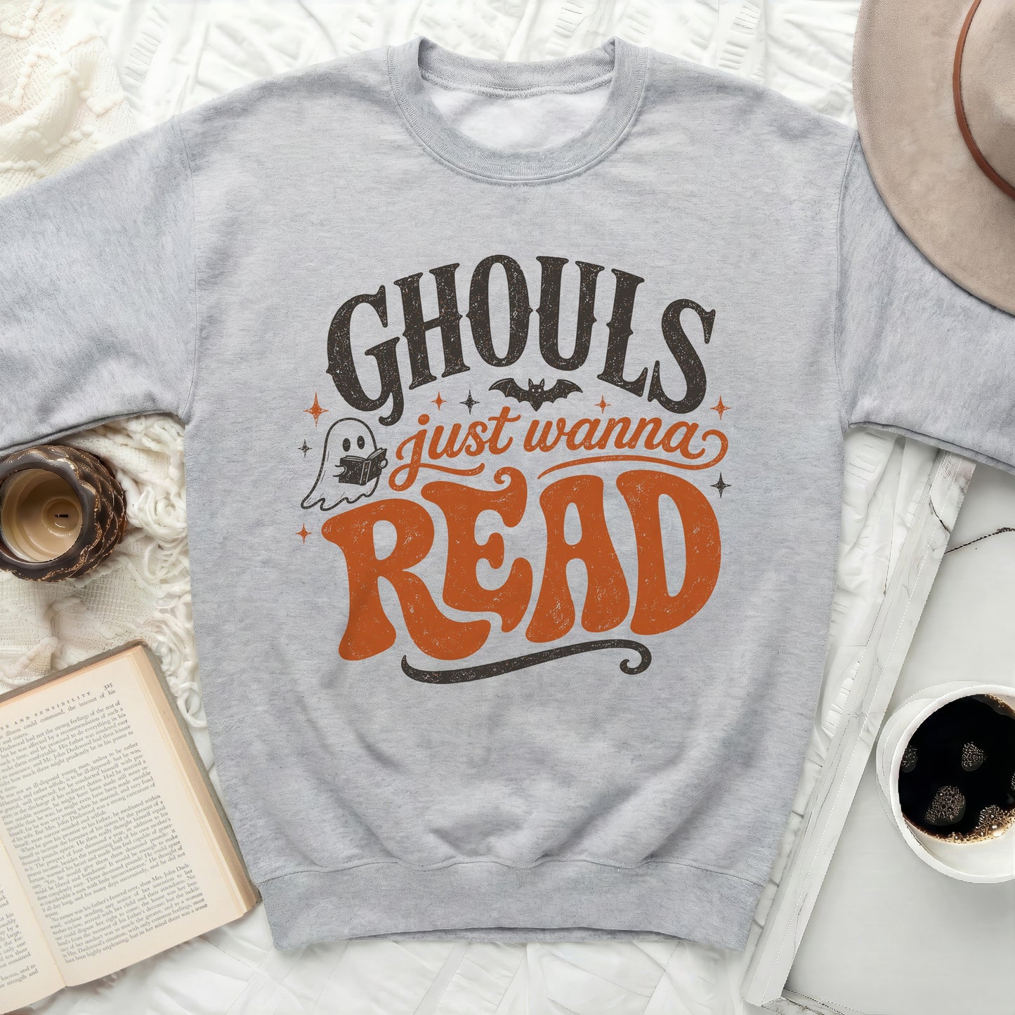 Gray sweatshirt with "Ghouls just wanna Read" graphic