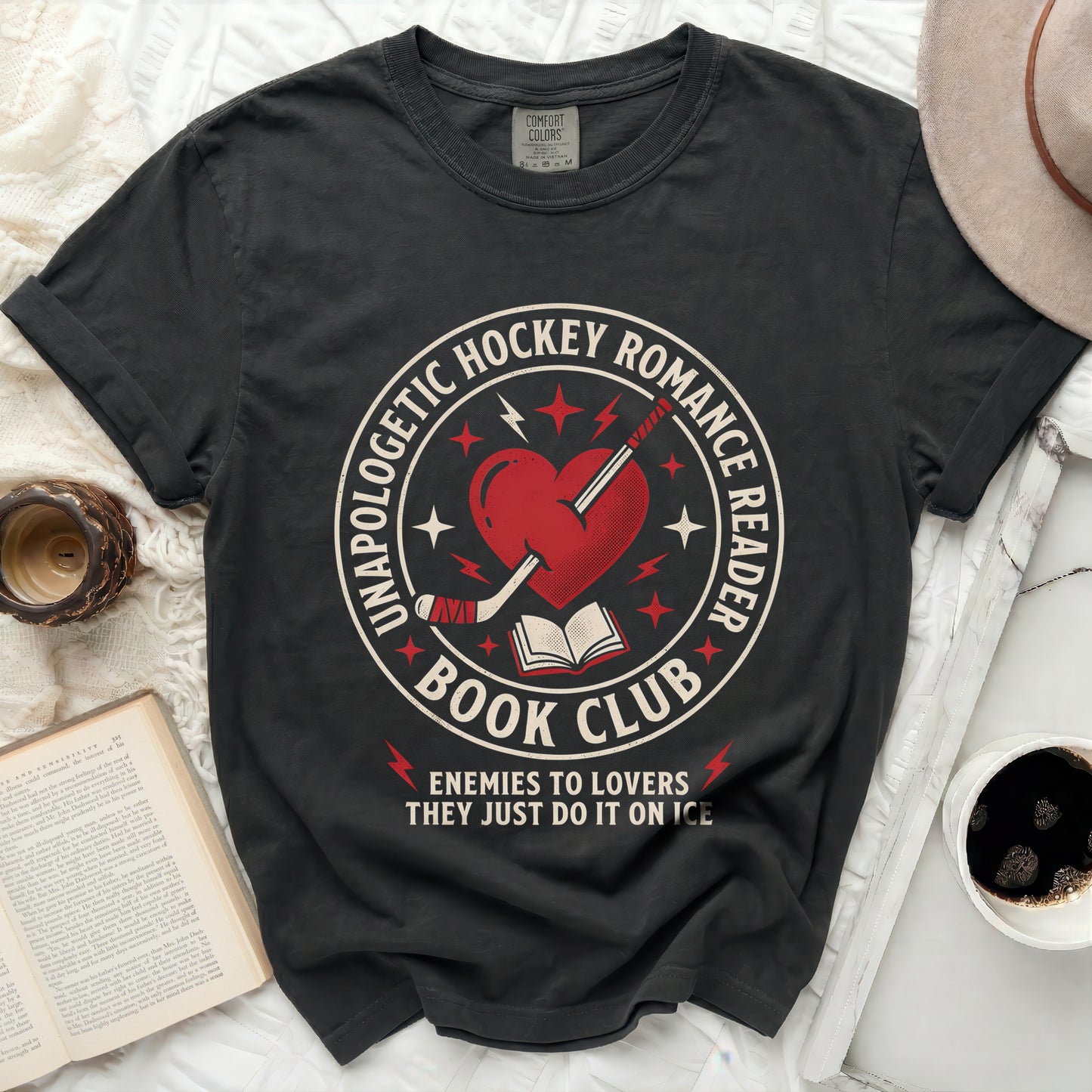 Black t-shirt with "Unapologetic Hockey Romance Reader" and book club text.