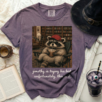 Purple t-shirt with graphic of raccoon wearing sunglasses and hat.