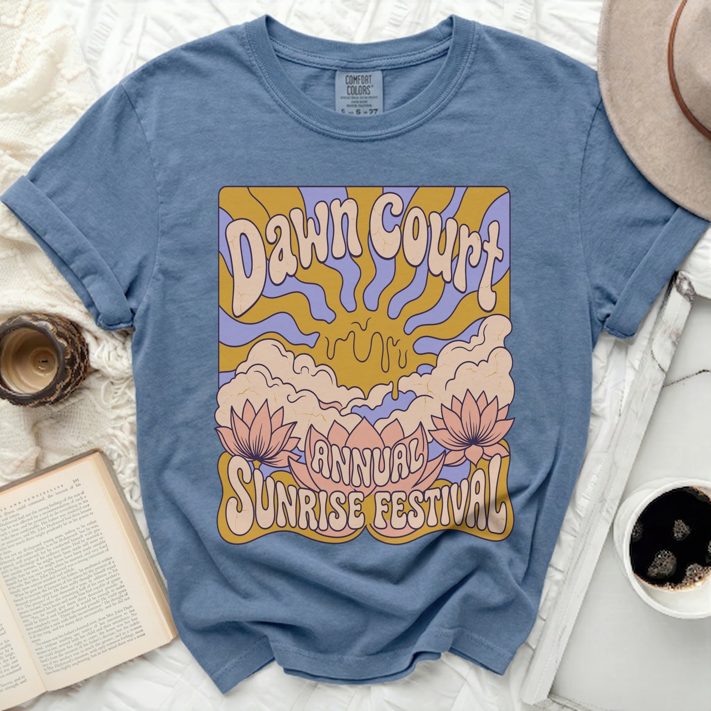 Blue t-shirt with "Dawn Court Annual Sunrise Festival" graphic.