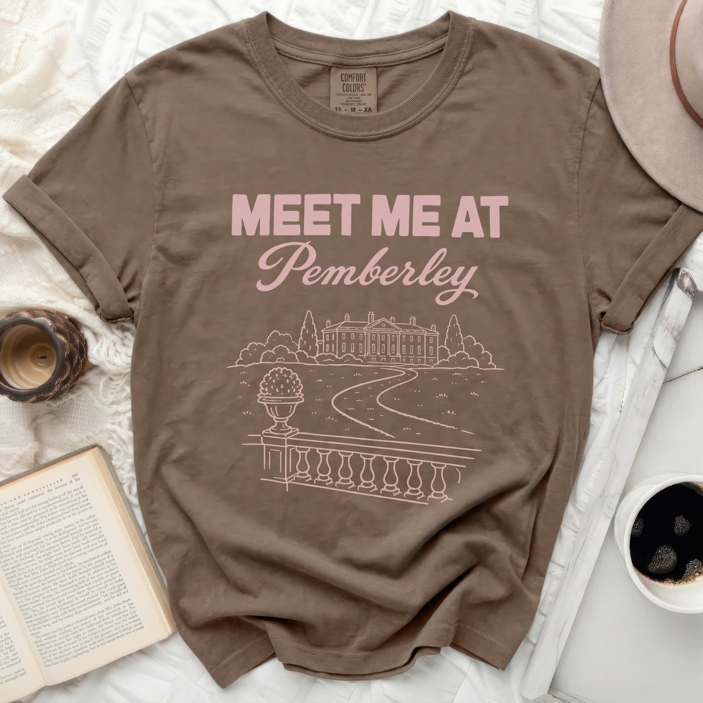 Brown t-shirt with "Meet Me At Pemberley" and estate graphic
