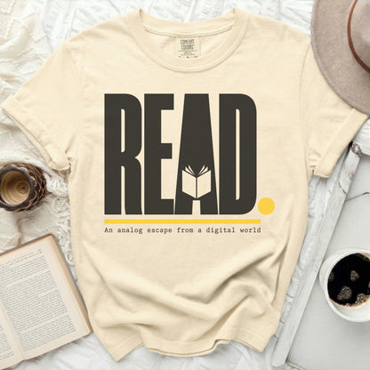 Cream t-shirt with "READ An analog escape from a digital world" graphic.