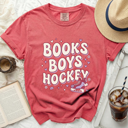 Red t-shirt with "BOOKS BOYS HOCKEY" and ice skates graphic.