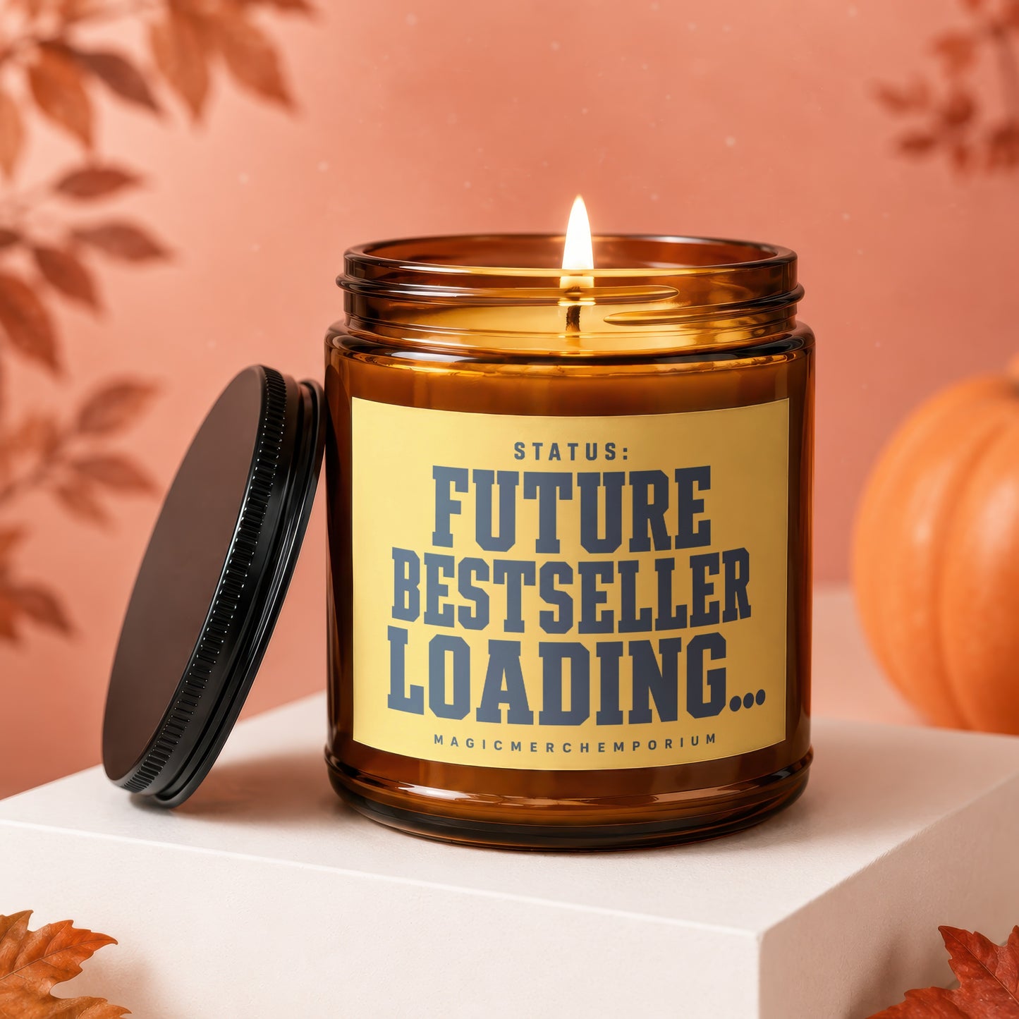Amber candle with burning wick, reads "Status: Future Bestseller Loading..."