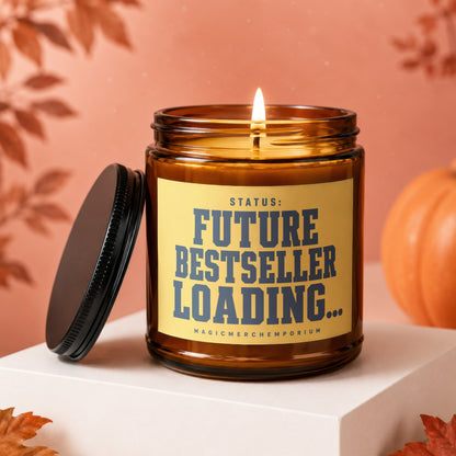 Amber candle with burning wick, reads "Status: Future Bestseller Loading..."