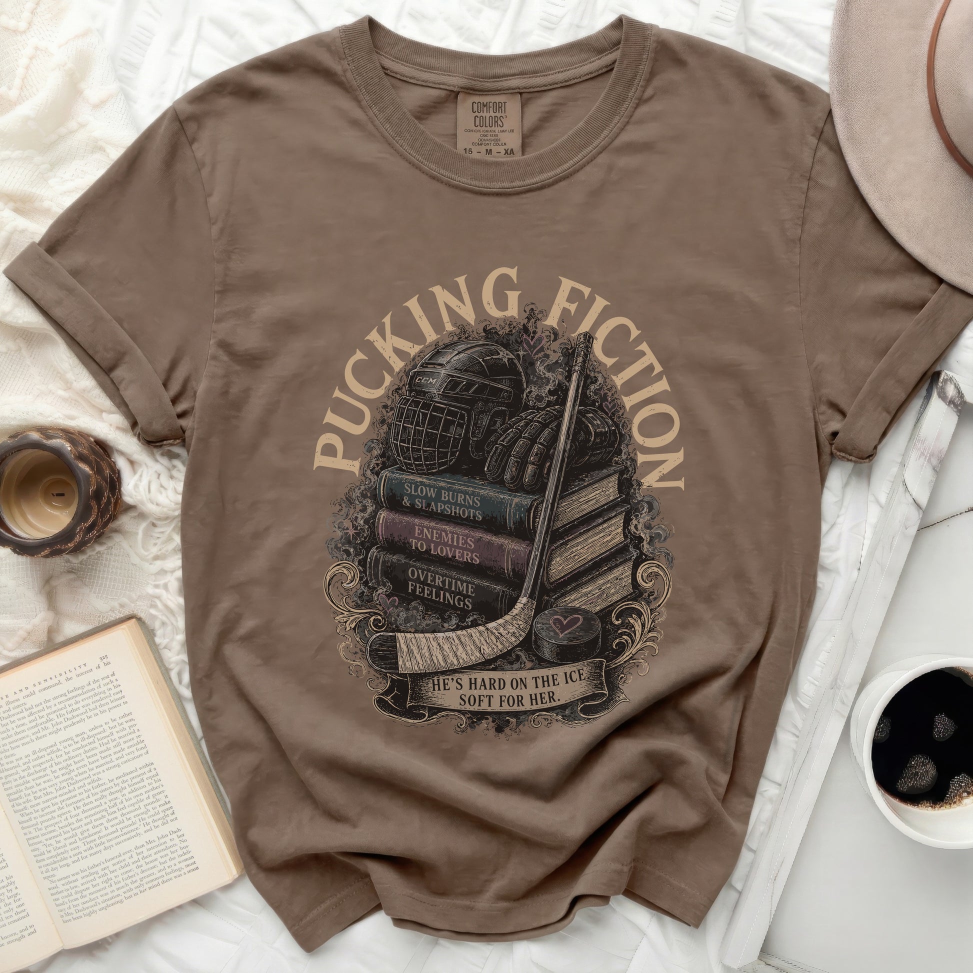 T-shirt with "Pucking Fiction" and book stack design.