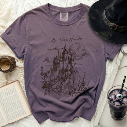 Purple t-shirt with "Be Mine, Monster." text and castle graphic.