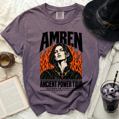 Purple t-shirt with "AMREN" text and a woman graphic with flames.