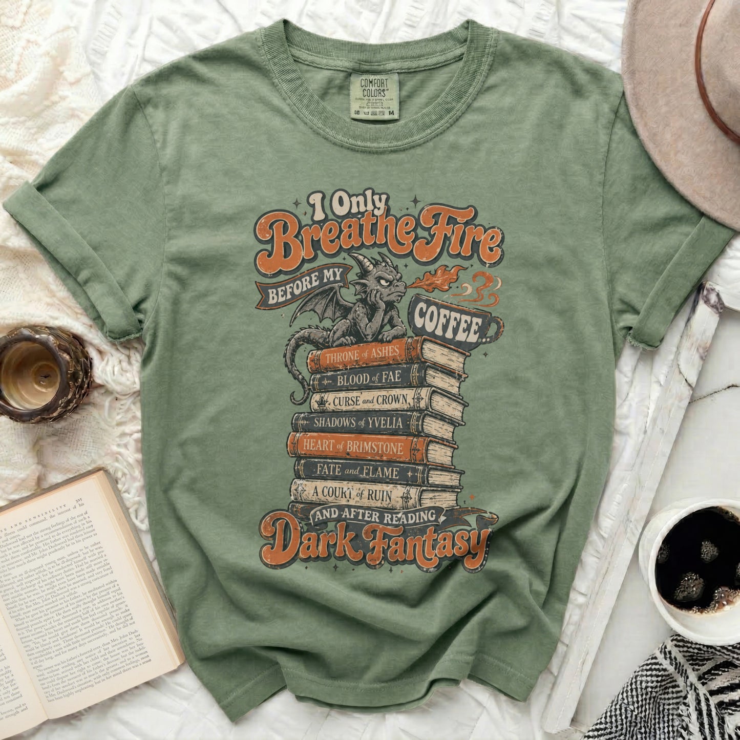 T-shirt with dragon and stack of books, "I Only Breathe Fire... and Coffee" title.