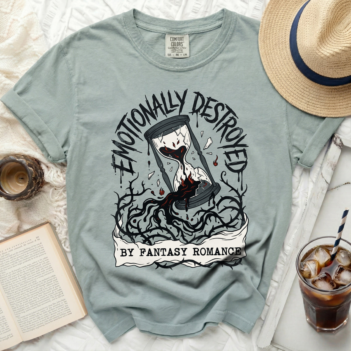 T-shirt with a broken hourglass graphic and text "Emotionally Destroyed By Fantasy Romance".