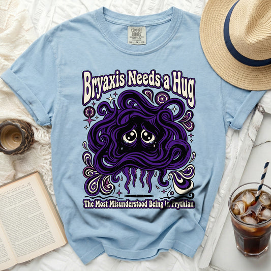 Light blue t-shirt with "Bryaxis Needs a Hug" and a sad creature graphic.