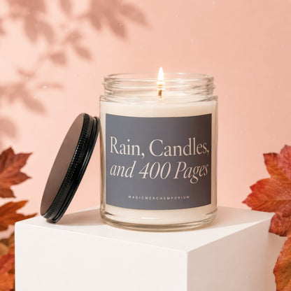 Glass candle with black lid and label reading "Rain, Candles, and 400 Pages".