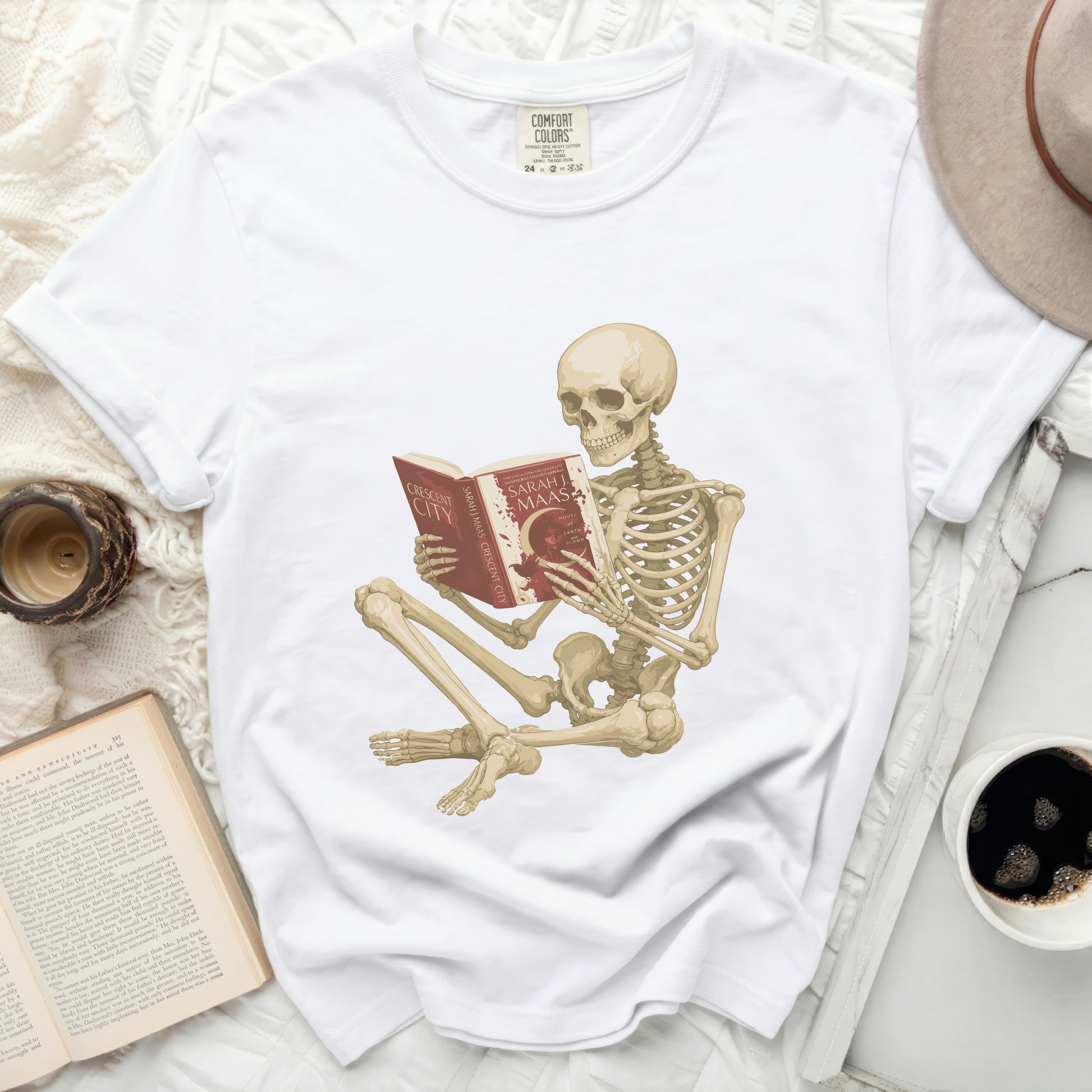 Skeleton reading "Crescent City" by Sarah J. Maas, with "House of Earth and Blood" visible.