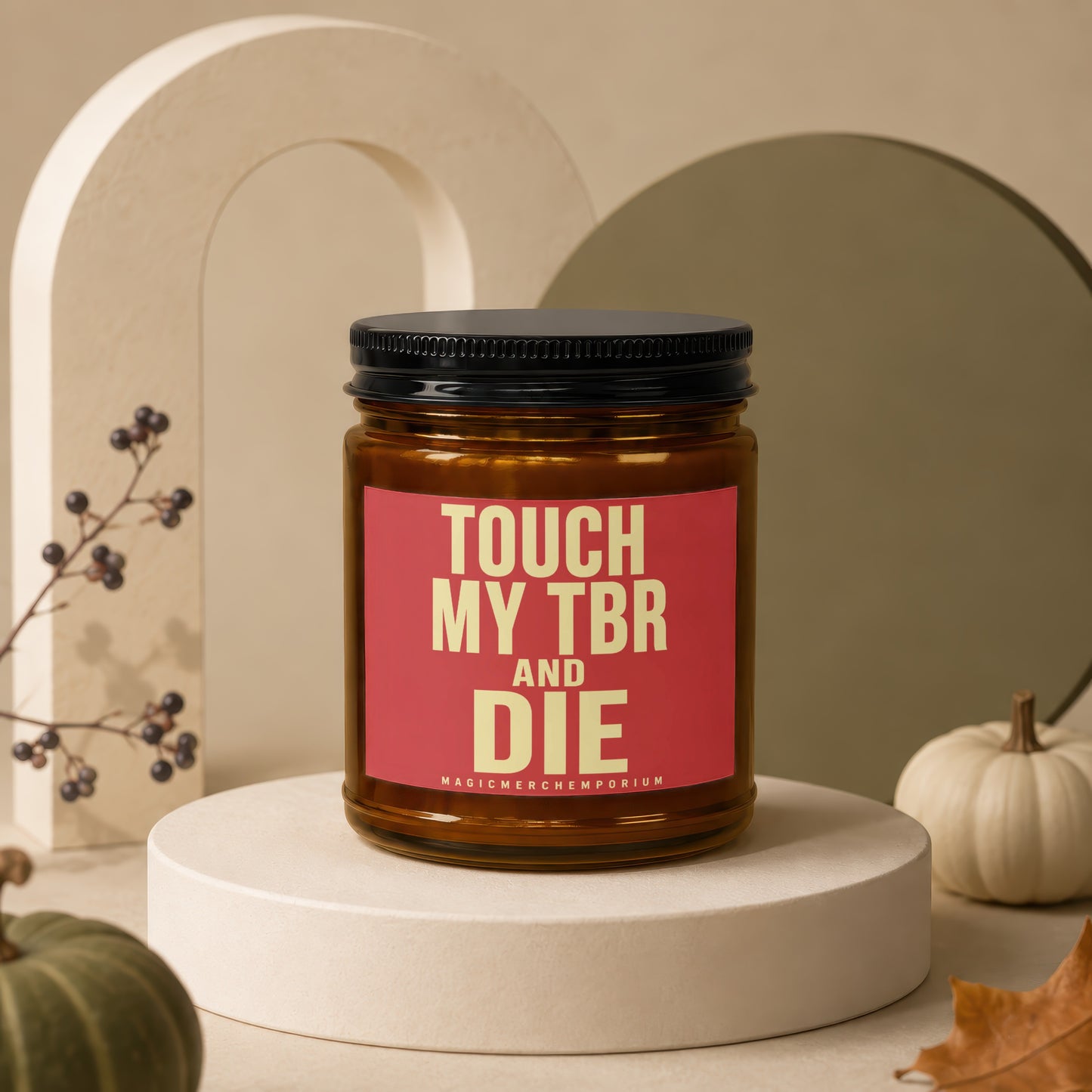 Amber jar candle with red label reading "TOUCH MY TBR AND DIE".