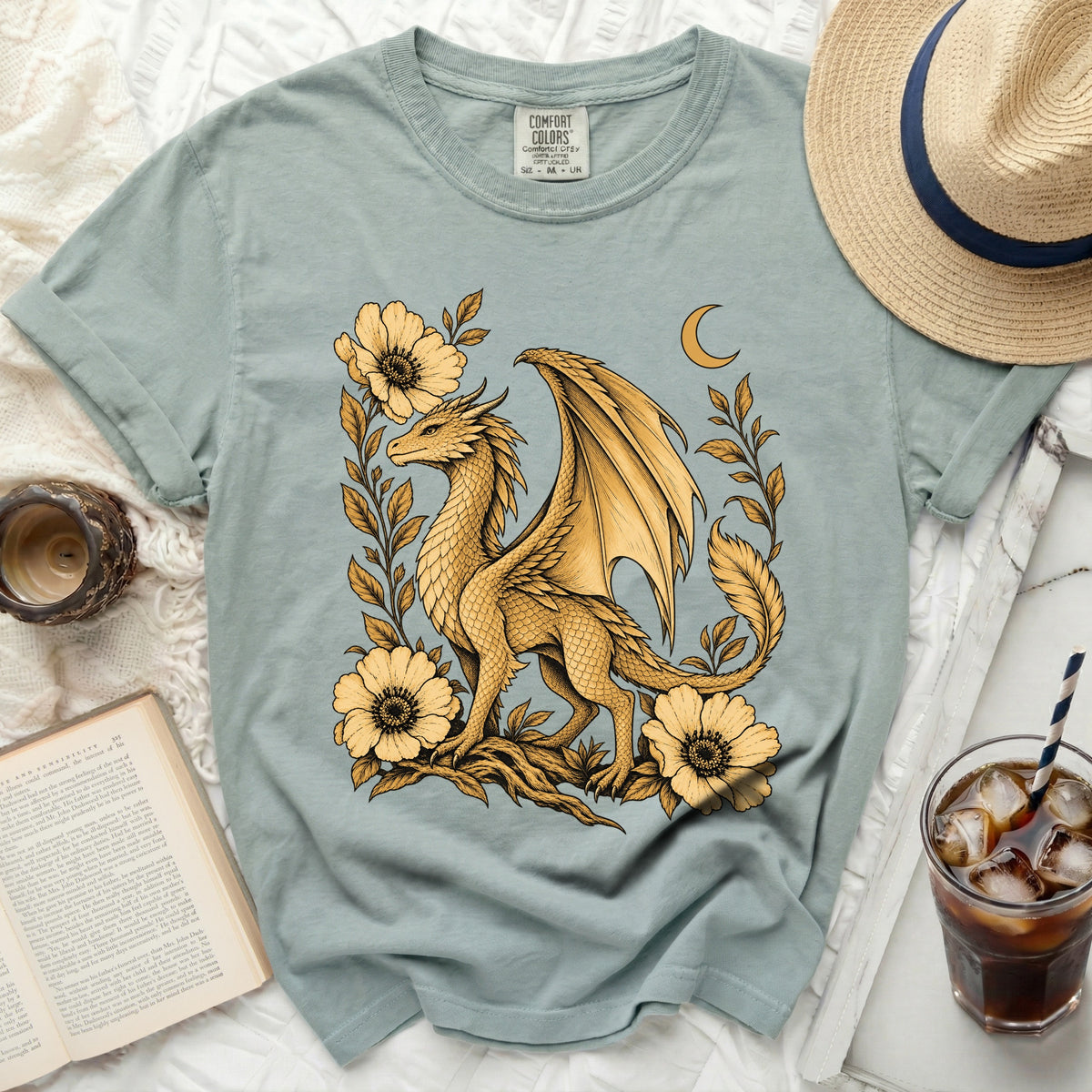 Light blue t-shirt with a gold dragon and floral design, featuring a Comfort Colors tag.
