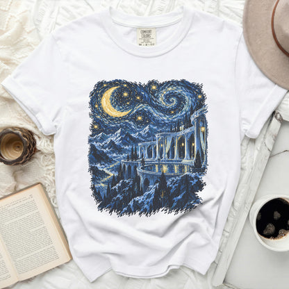 White t-shirt with a starry night landscape featuring mountains and a grand archway.