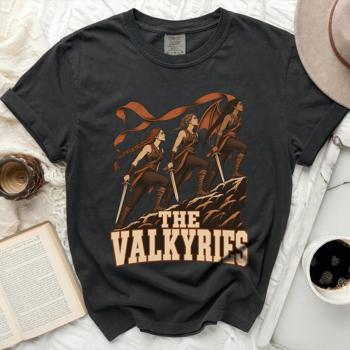 Dark grey t-shirt featuring "The Valkyries" graphic of three warrior women with swords.