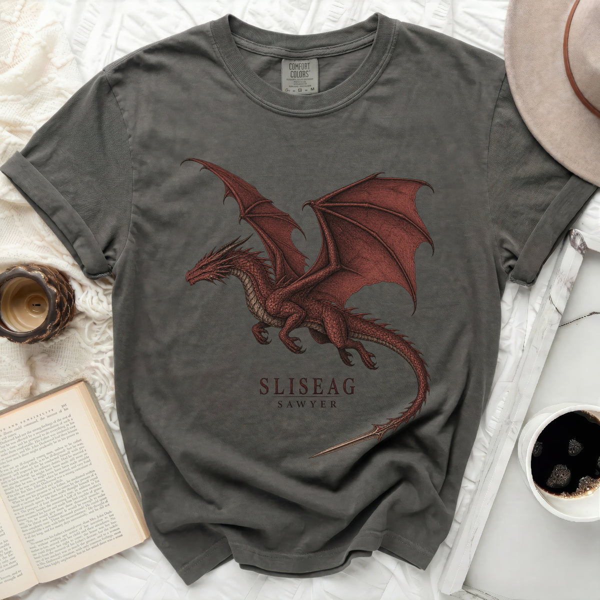 Dark grey t-shirt with a red dragon graphic and text "SLISEAG SAWYER".