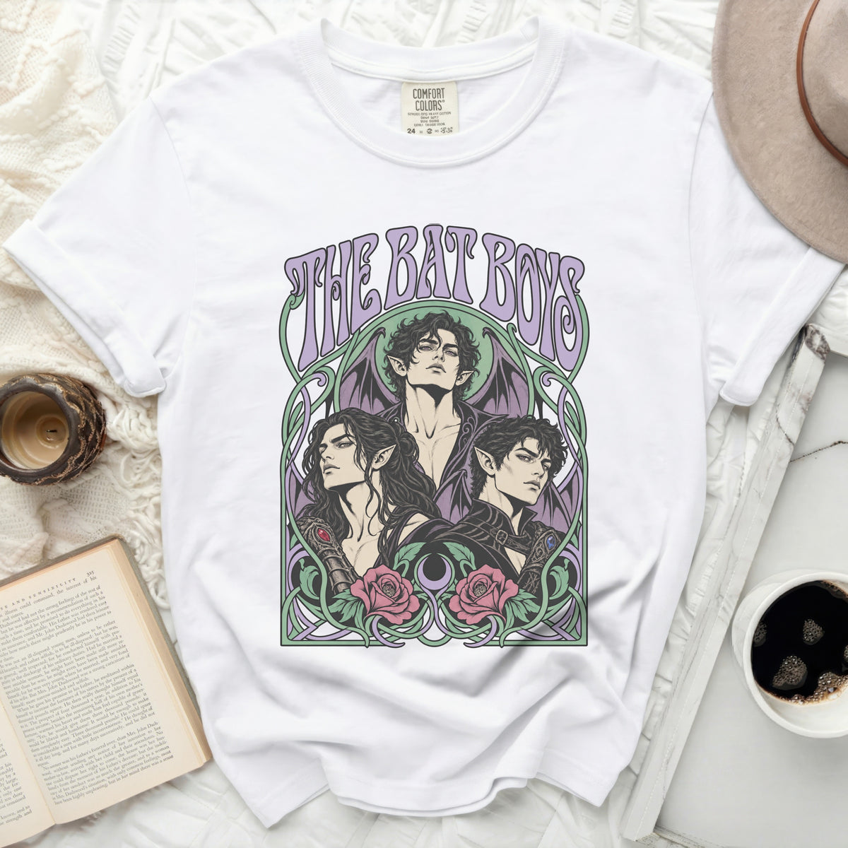 White t-shirt with "THE BAT BOYS" text and illustration of three winged figures.