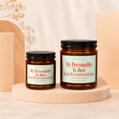 Two amber jars with black lids displaying "My Personality Is Just Book Recommendations".