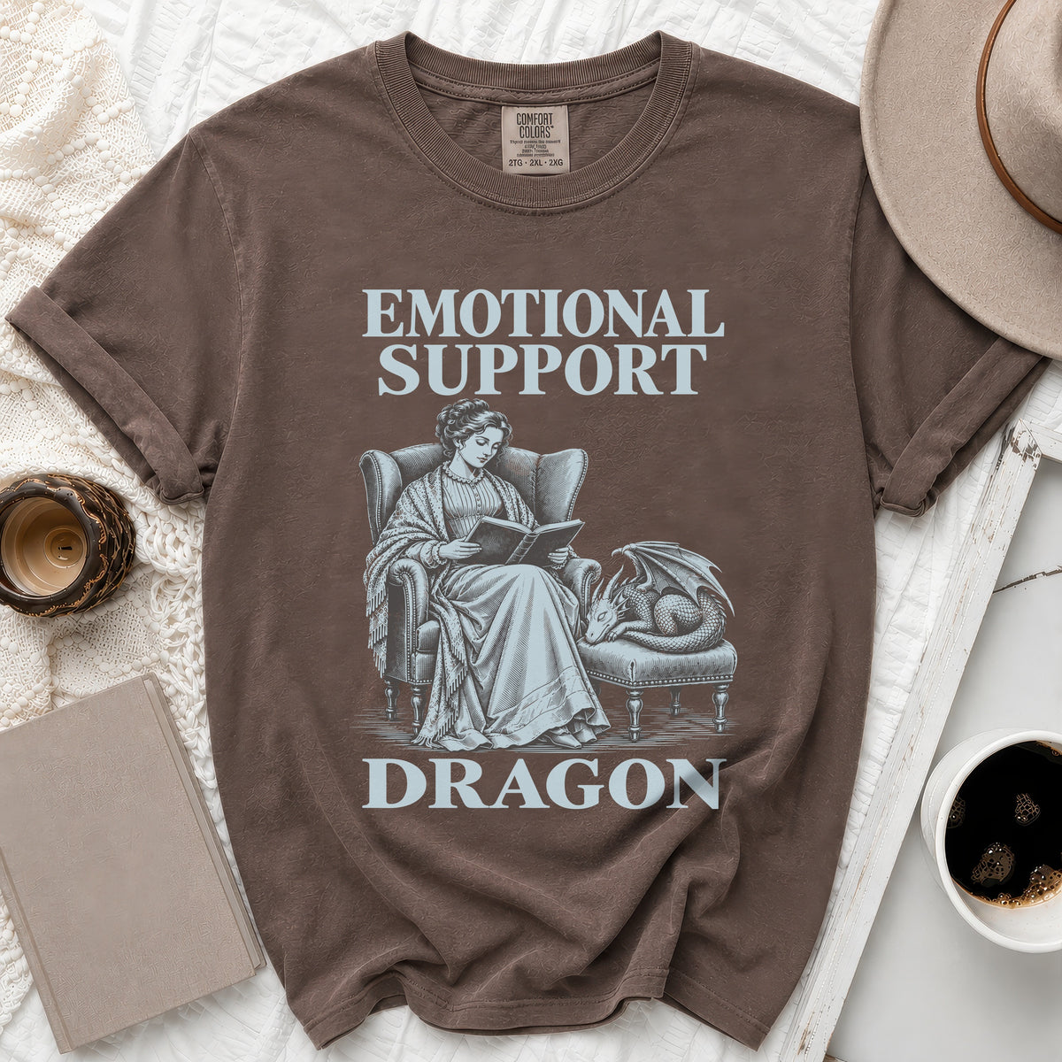 Brown t-shirt with "Emotional Support Dragon" text and vintage illustration.
