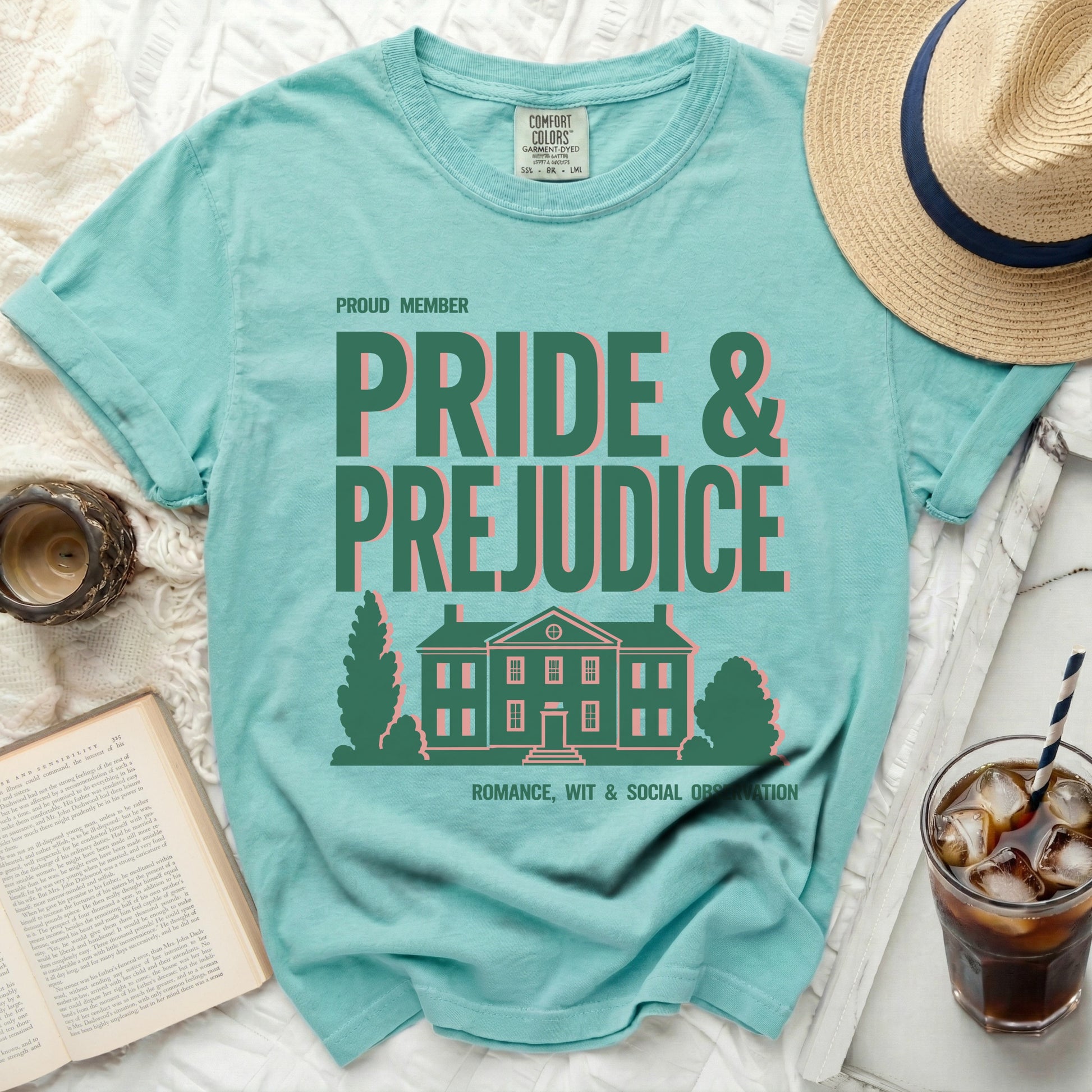 Proud member Pride & Prejudice t-shirt with a house graphic.