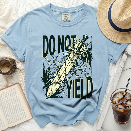 Light blue t-shirt with "DO NOT YIELD" and sword design.