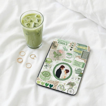Green-themed Kindle cover with book, tea, and romantic couple stickers.