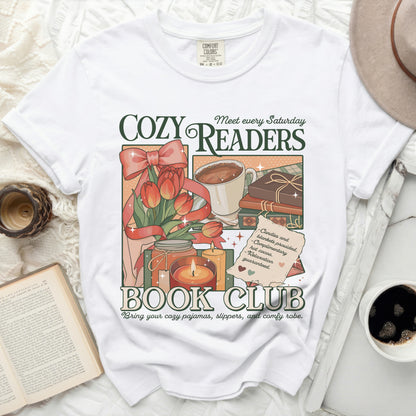 White t-shirt graphic for a "Cozy Readers Book Club."