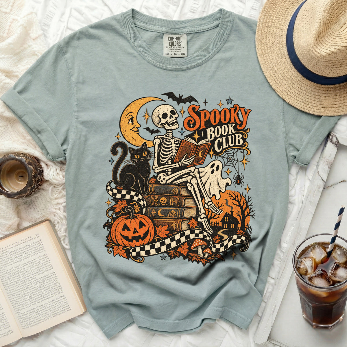 Skeleton reading book with "Spooky Book Club" text and Halloween elements.