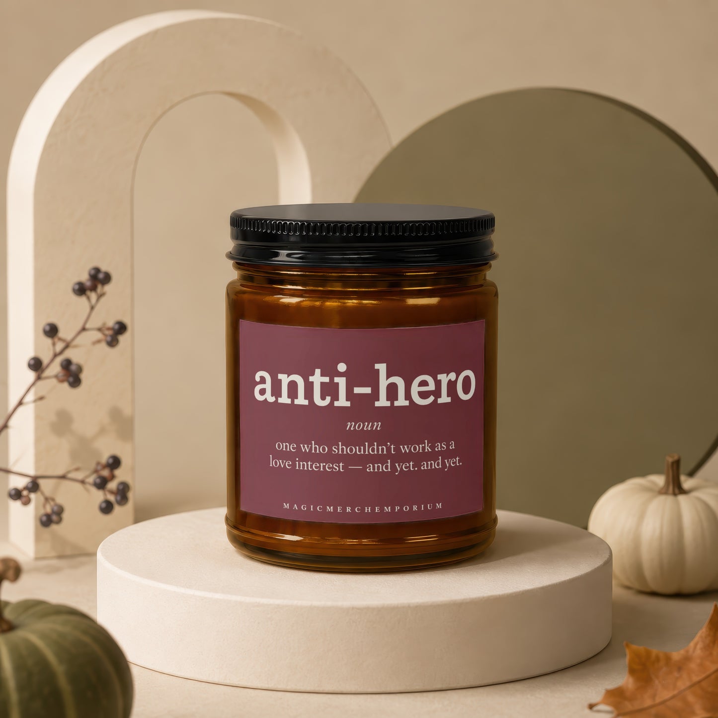 Amber candle in a jar with "anti-hero" definition label.