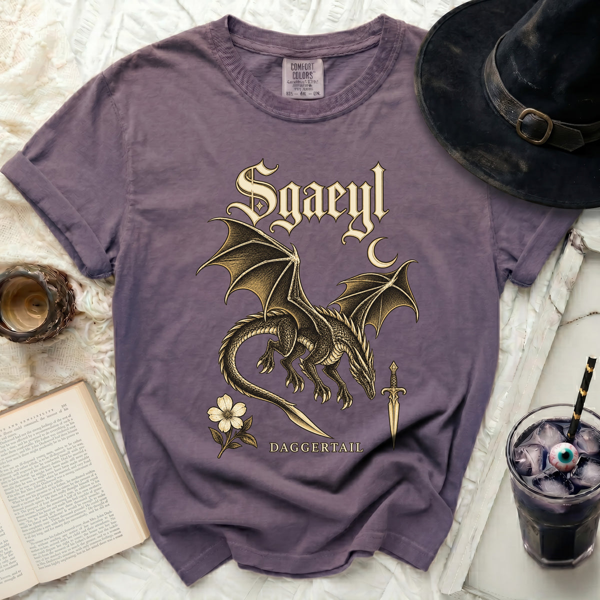 Purple t-shirt with "Sgaeyl Daggertail" text and a dragon design.