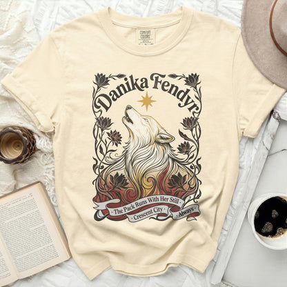 Cream t-shirt with wolf artwork and "Crescent City" text.