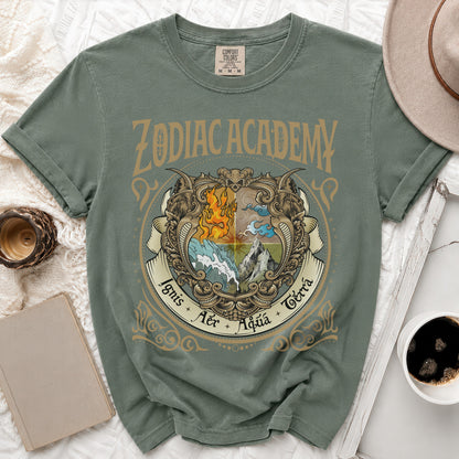 Green t-shirt with "ZODIAC ACADEMY" and elemental crest: fire, air, water, earth.