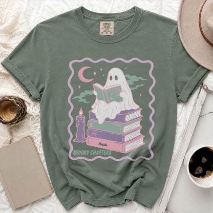 Ghost reading a book on a stack of books with "Spooky Chapters" text.