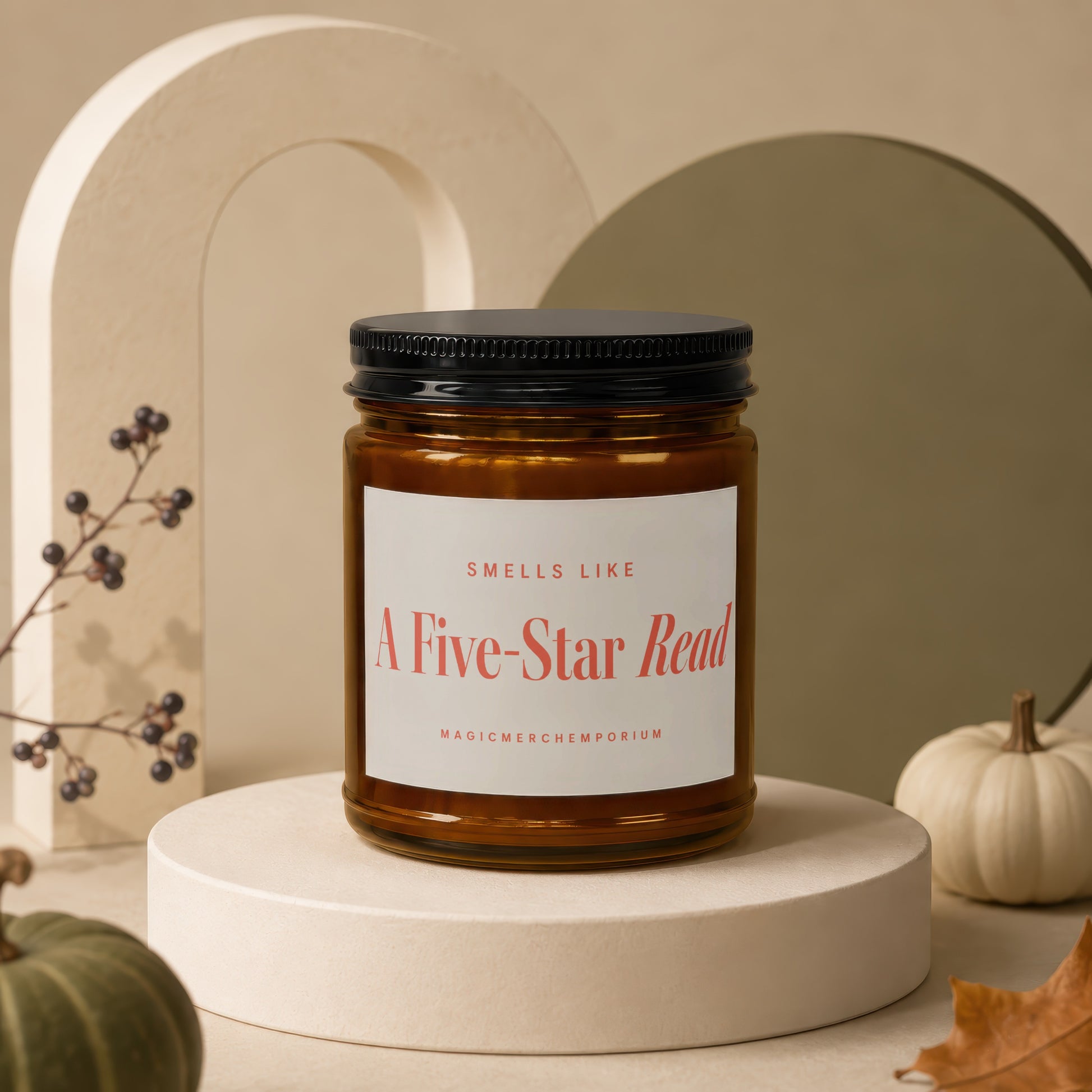 Amber jar candle with black lid reading "Smells Like A Five-Star Read MagicMerchEmporium".