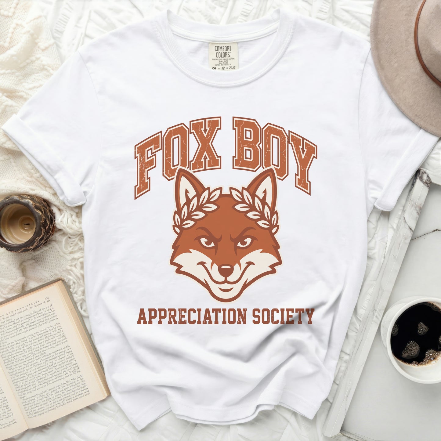 White t-shirt with distressed graphic of a fox wearing a laurel wreath.