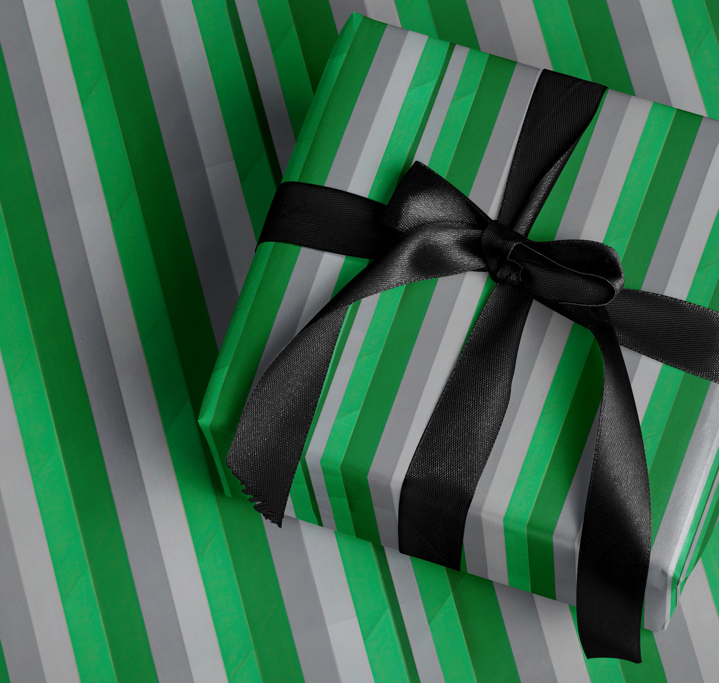 Green and Gray Striped Gift Box with Black Bow