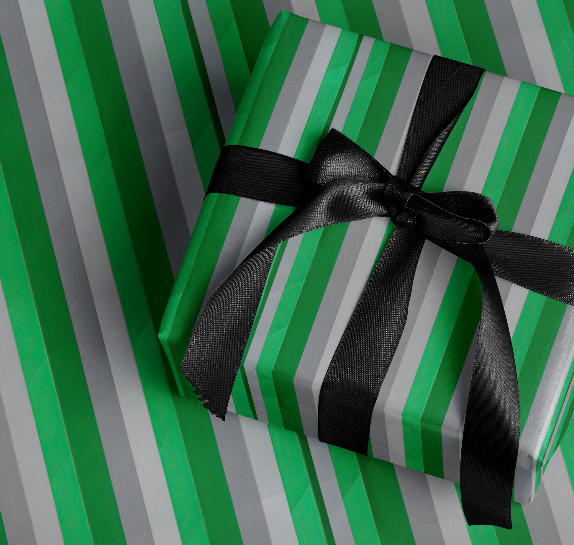 Green and Gray Striped Gift Box with Black Bow