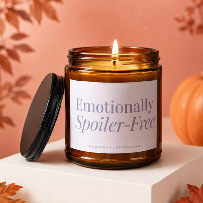 Amber jar candle with lid askew reads "Emotionally Spoiler-Free".