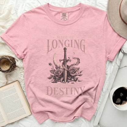 Pink t-shirt with sword, roses, moon, and text "MADE OF LONGING FUELED BY DESTINY".