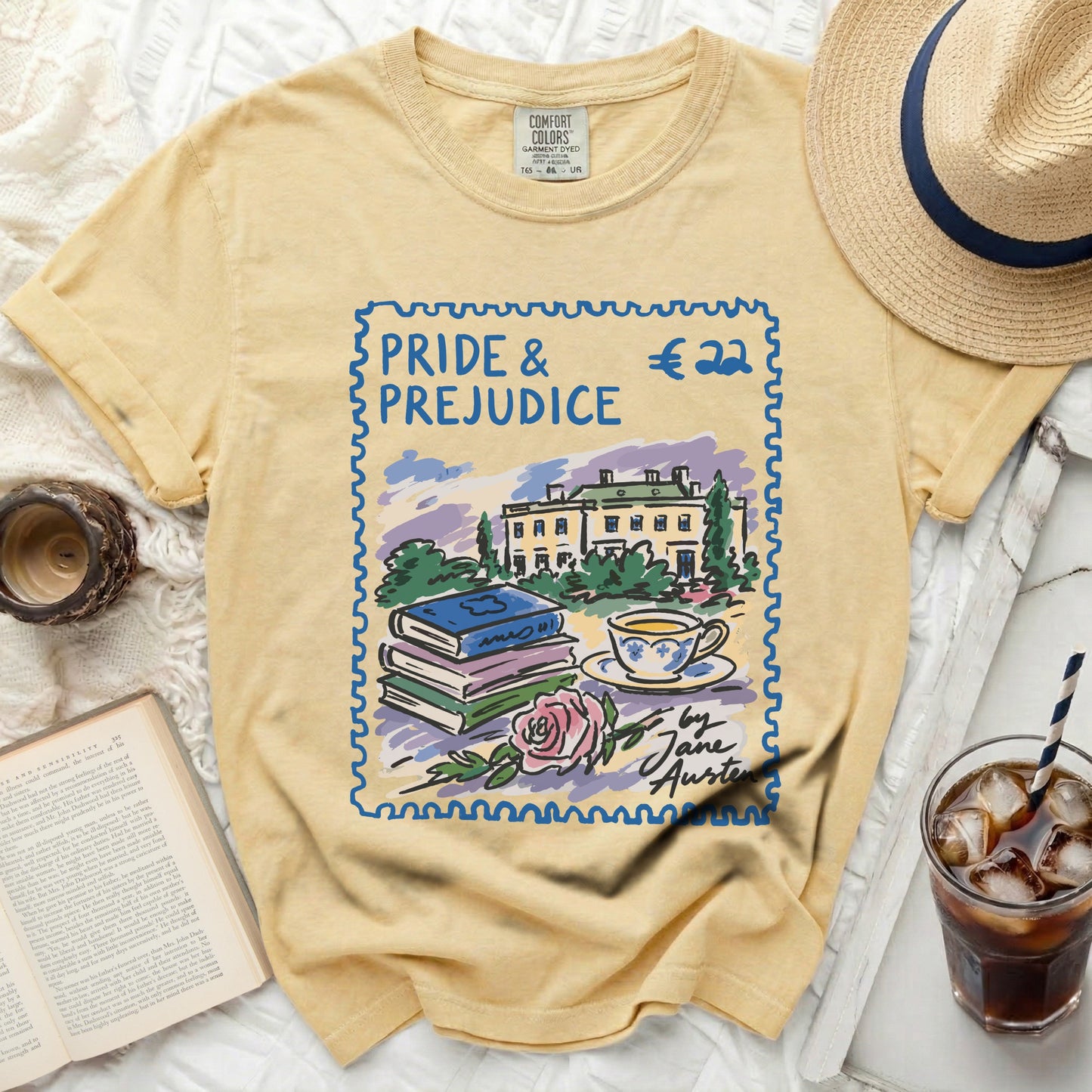 Yellow t-shirt with a stamped illustration of Pride and Prejudice.
