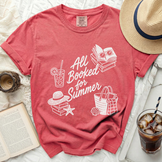 Red t-shirt with "All Booked for Summer" text and beach icons.