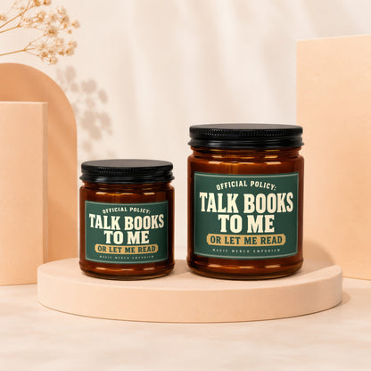 Two amber jars with black lids, labeled "Talk Books To Me Or Let Me Read."