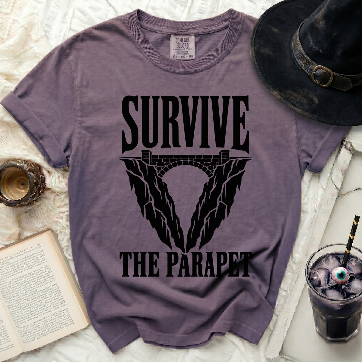 Purple t-shirt with "SURVIVE THE PARAPET" graphic and bridge illustration.